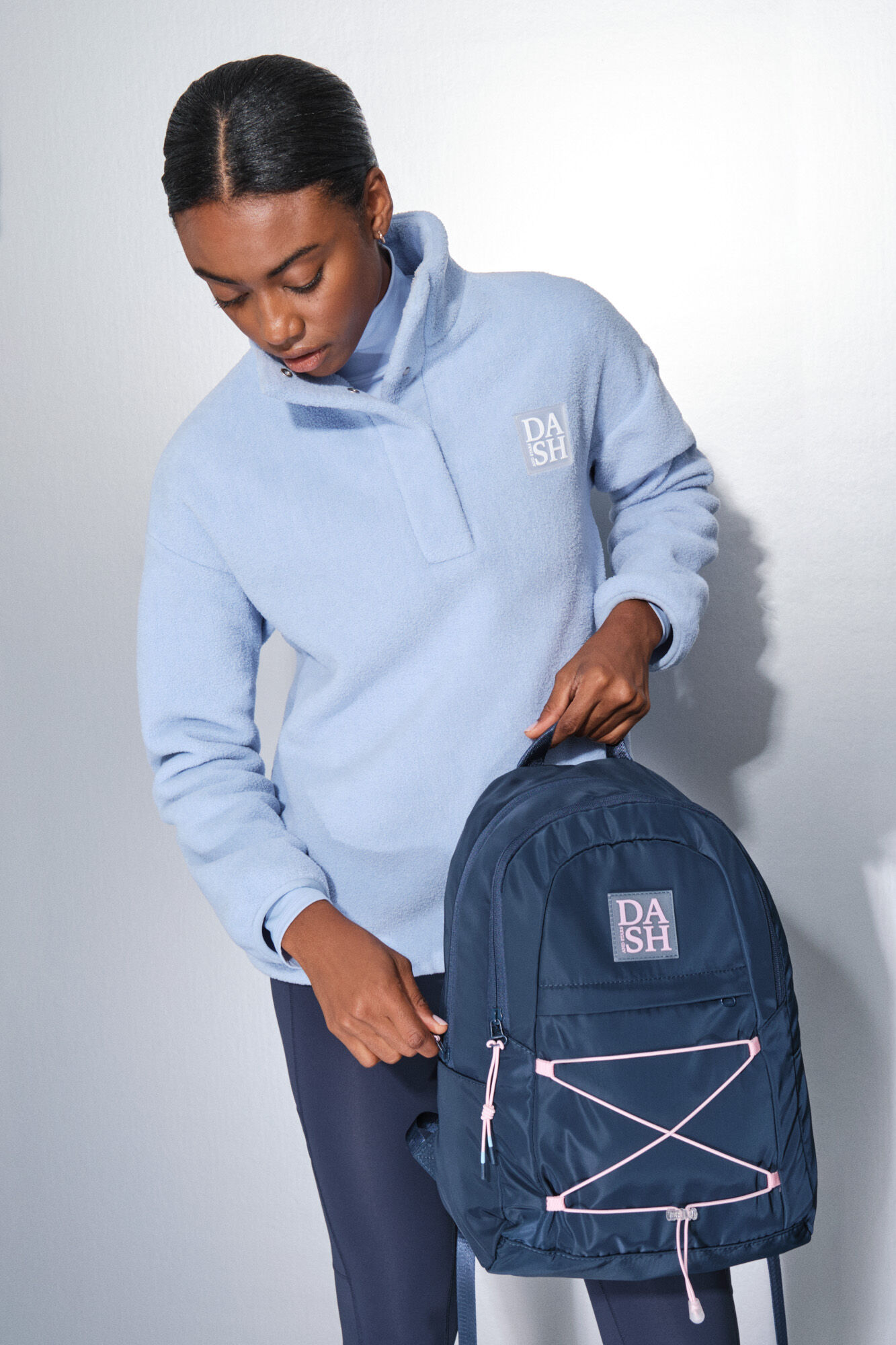 Dash and Stars Mochila deportiva azul con gomas rosas