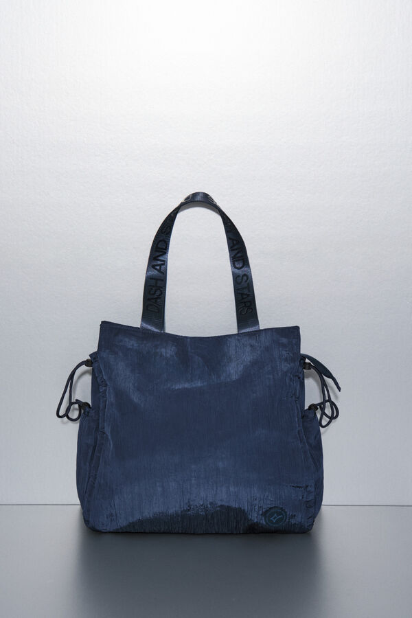 Dash and Stars Bolsa de bolsa de nailon con satinado azul. azul