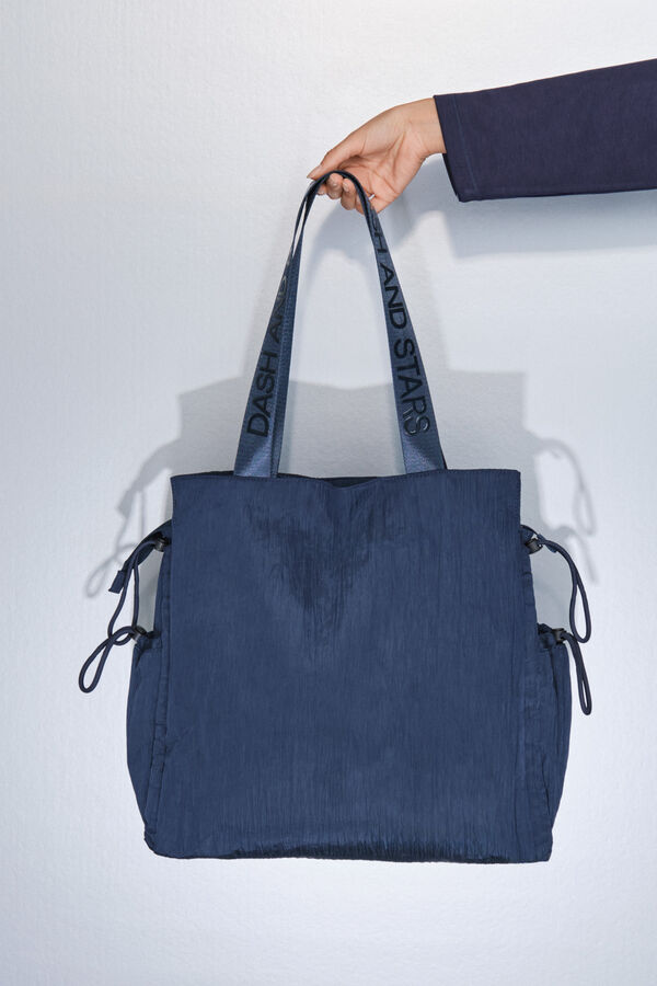 Dash and Stars Bolsa de bolsa de nailon con satinado azul. azul