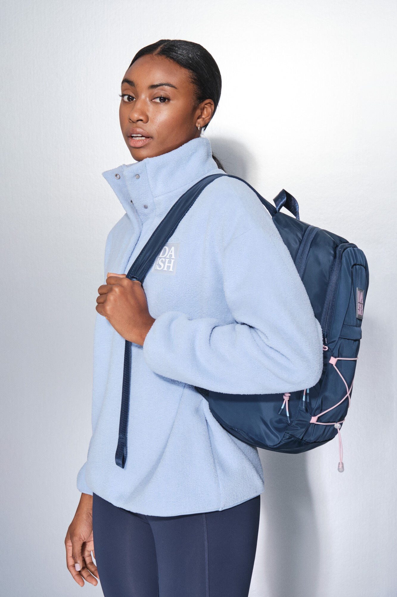 Dash and Stars Mochila deportiva azul con gomas rosas