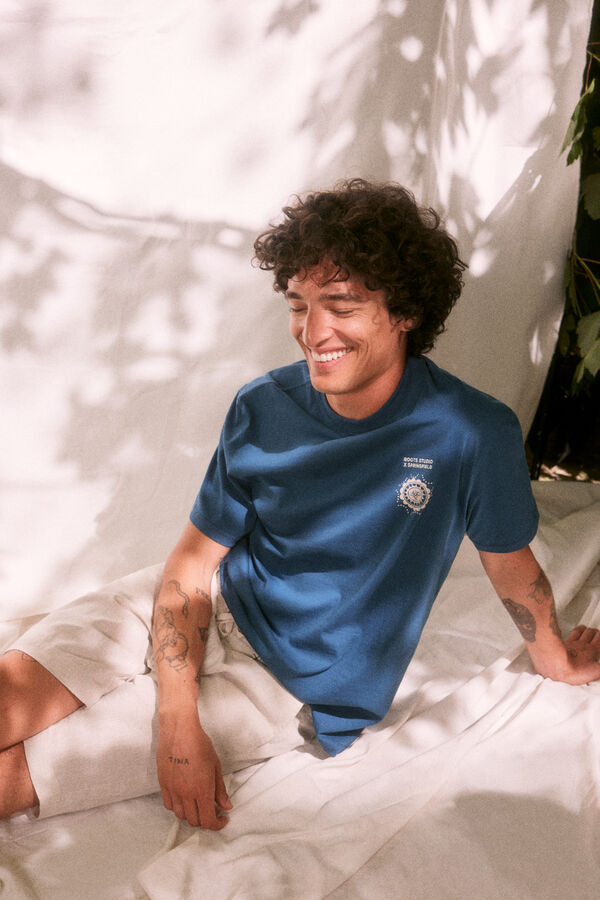 Springfield Playera estampado espalda "Roots Studio" azul