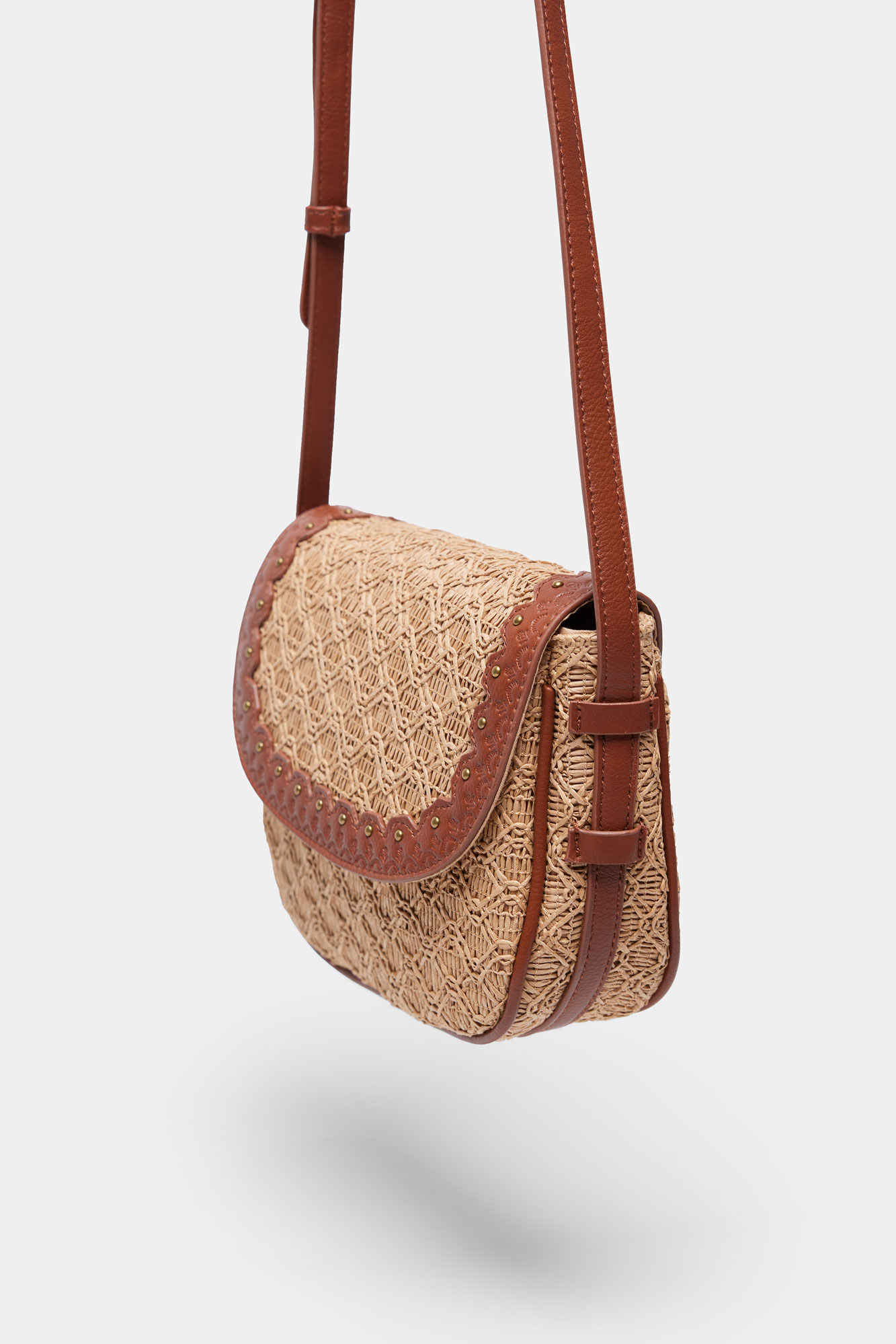 Bolsa bandolera rafia combinada Ropa de mujer WomenSecret MX