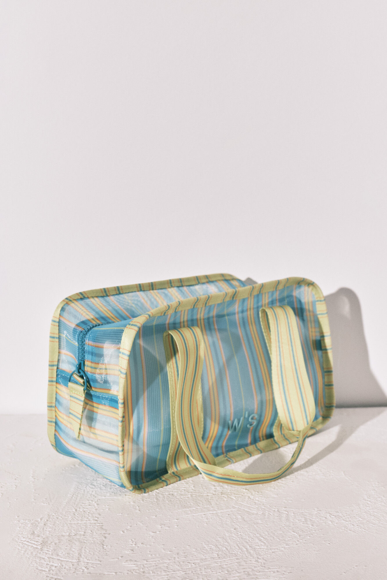 Women'secret Neceser mediano de malla a rayas azul y verde