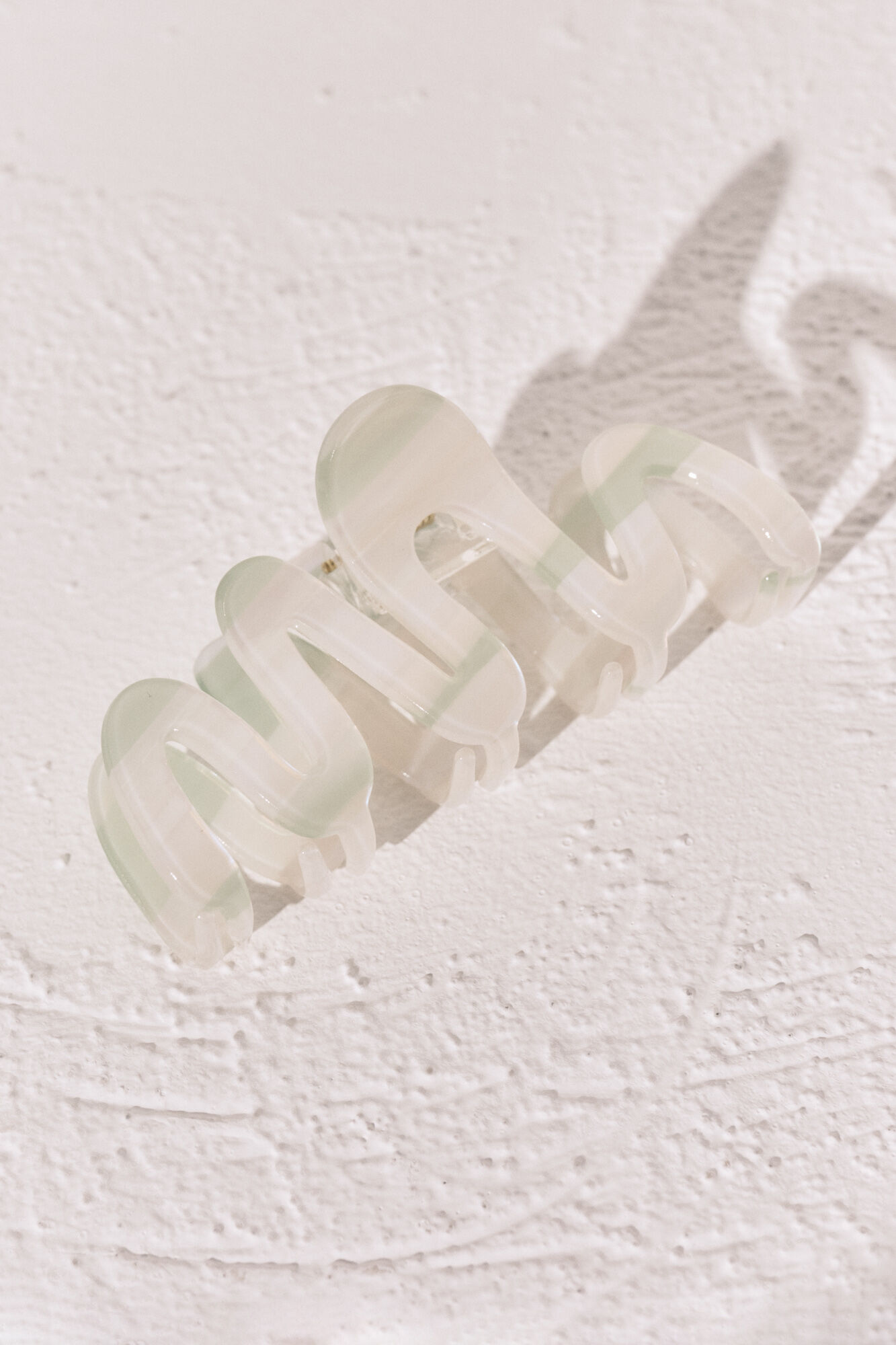Women'secret Pinza para el pelo con forma de onda verde