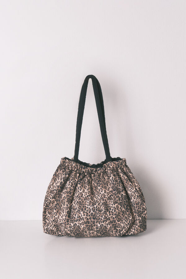 Women'secret Bolsa de bolsa reversible de nailon con estampado animal. estampado