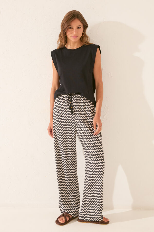 Womensecret Pantalón largo de viscosa con estampado ikat negro