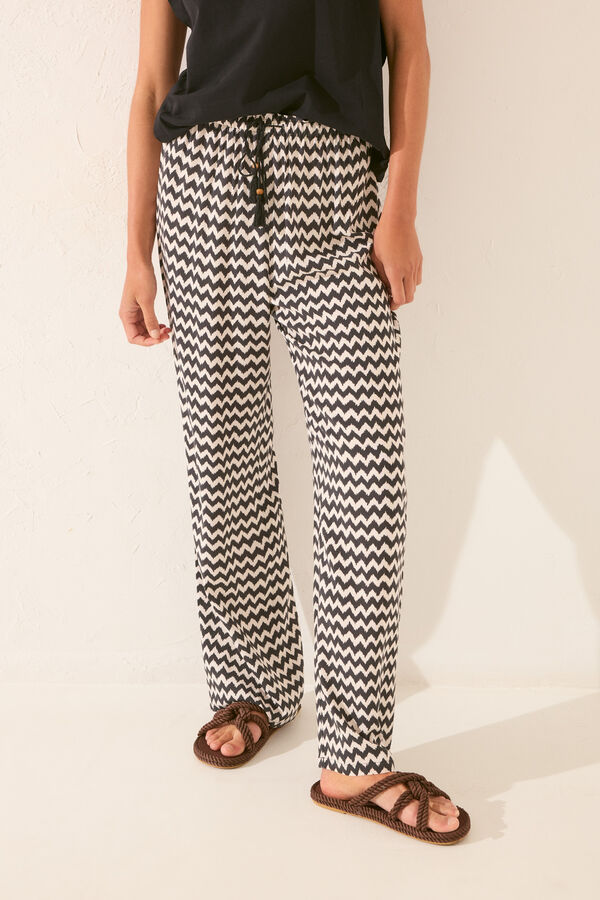 Womensecret Pantalón largo de viscosa con estampado ikat negro