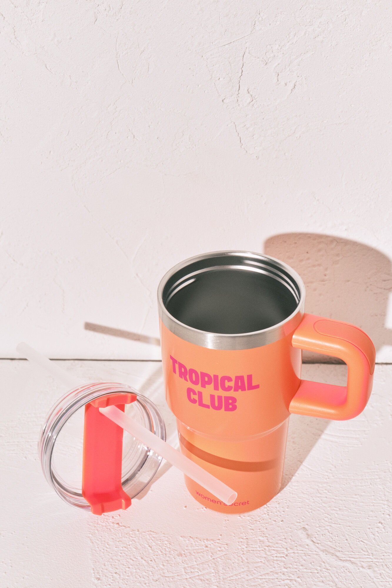 Women'secret Botella de acero inoxidable con asa naranja