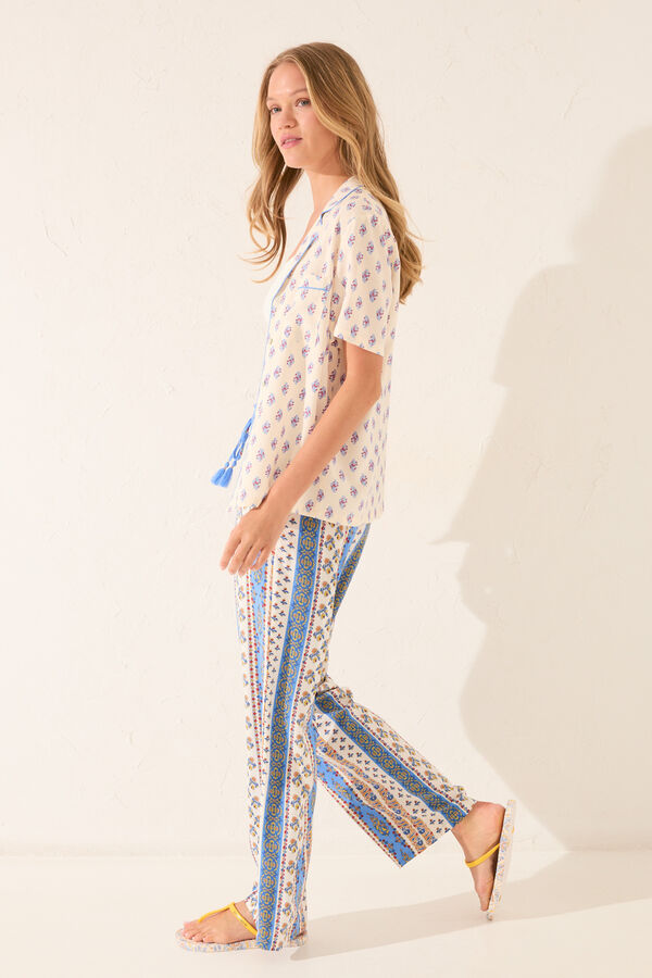 Womensecret Pantalón largo de viscosa con ribetes multicolor estampado