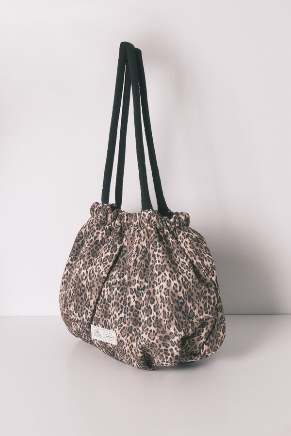 Women'secret Bolsa de bolsa reversible de nailon con estampado animal. estampado