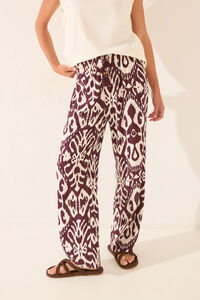 Womensecret Pantalón largo de viscosa con estampado floral púrpura