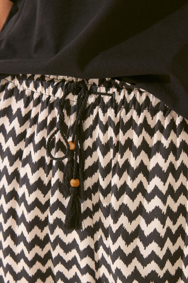 Womensecret Pantalón largo de viscosa con estampado ikat negro
