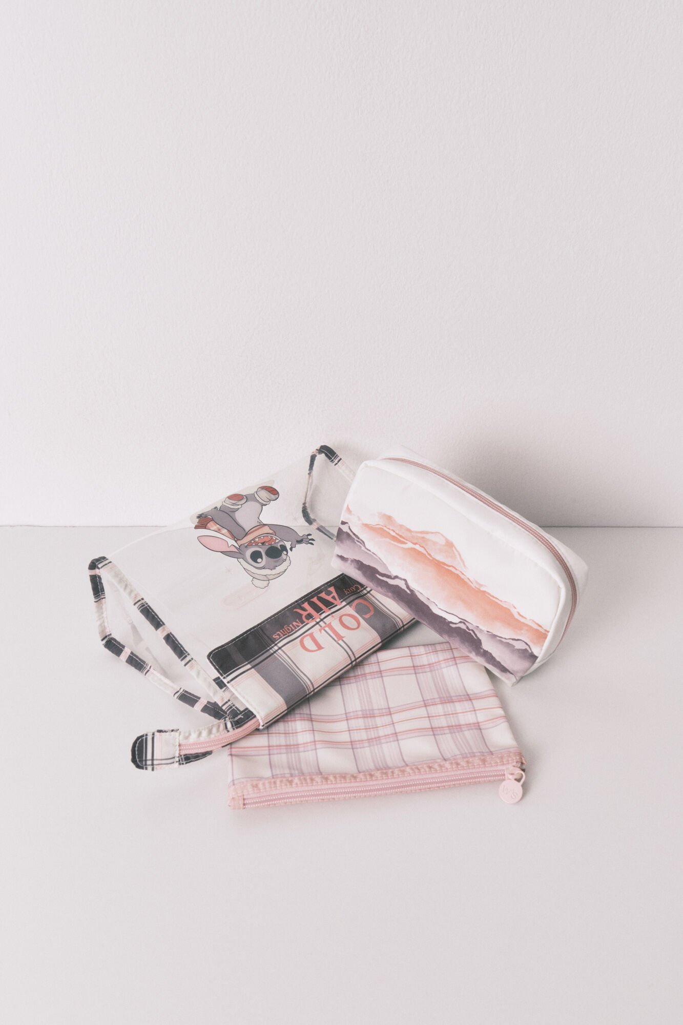 Women'secret Pack 3 neceseres estampado cuadros Stitch