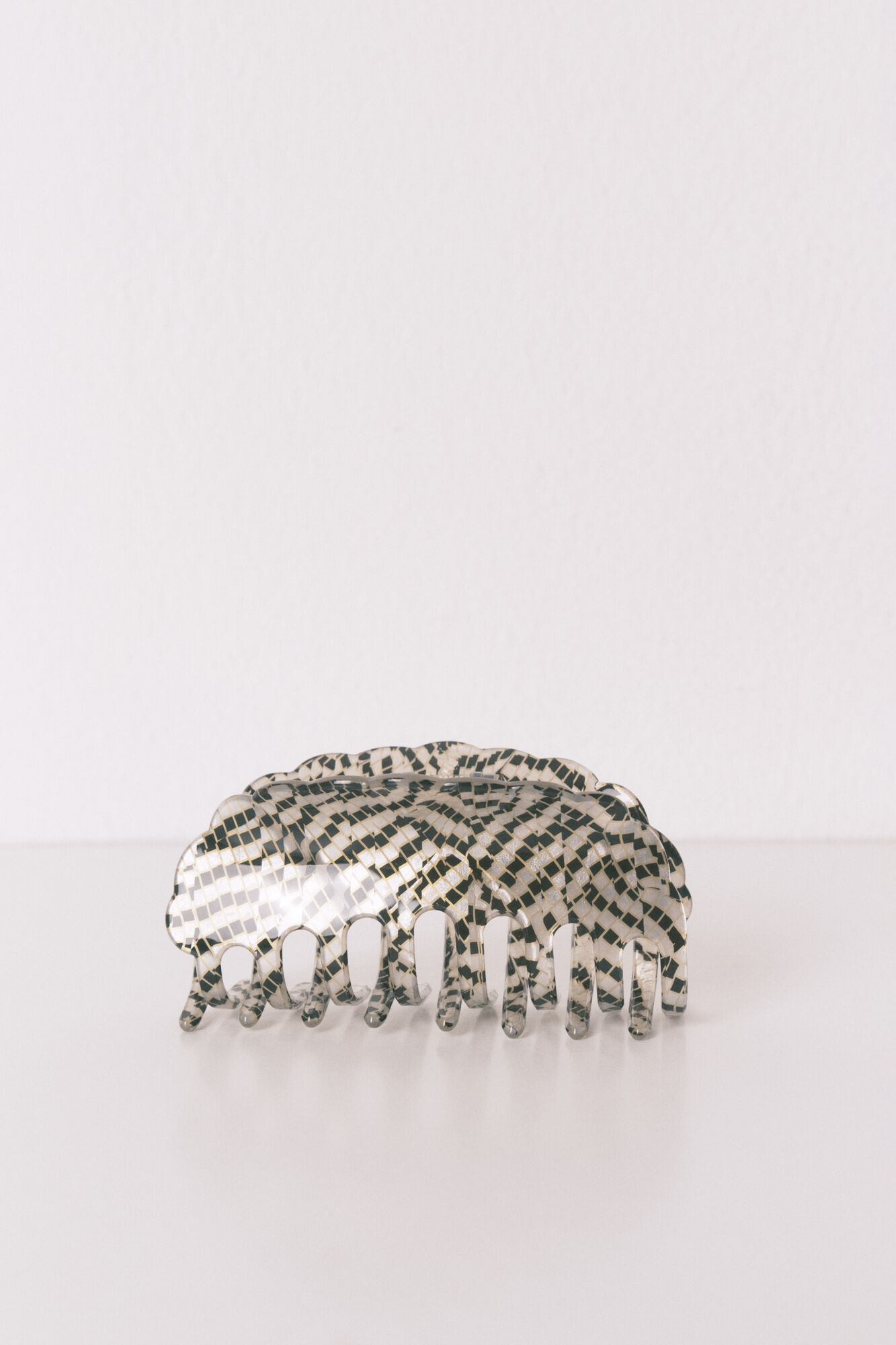 Women'secret Clip con efecto jaspeado y estampado de cuadros