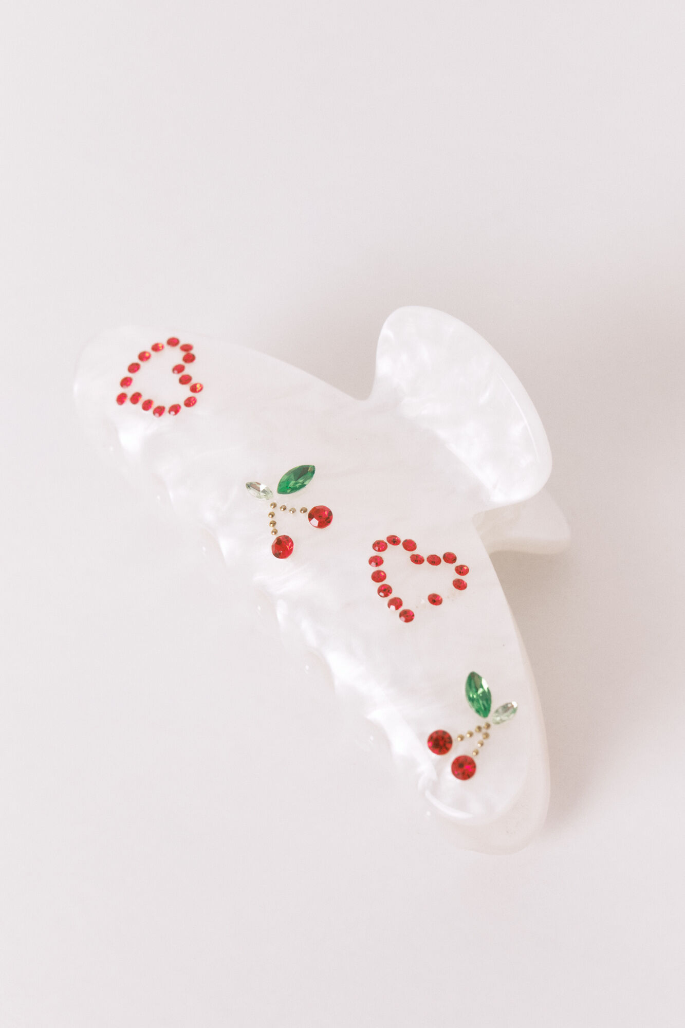 Women'secret Pinza marmoleada con brillos blanca